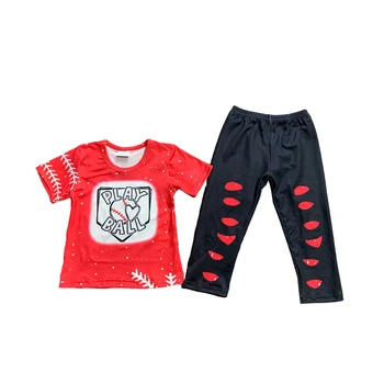Годишният бутик за дрехи за момичета, червен топ с къси ръкави, черни панталони с дупки, скъпа детски дрехи на едро